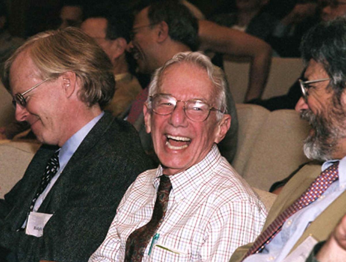 Art Rosenfeld laughs during a symposium for his 80th birthday. At left is Ralph Cavanagh of the Natural Resources Defense Council and on the right is John Holdren, then at Harvard.